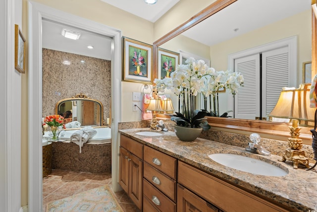 bathroom featuring double vanity, a bath, a shower with shower door, and tile patterned floors