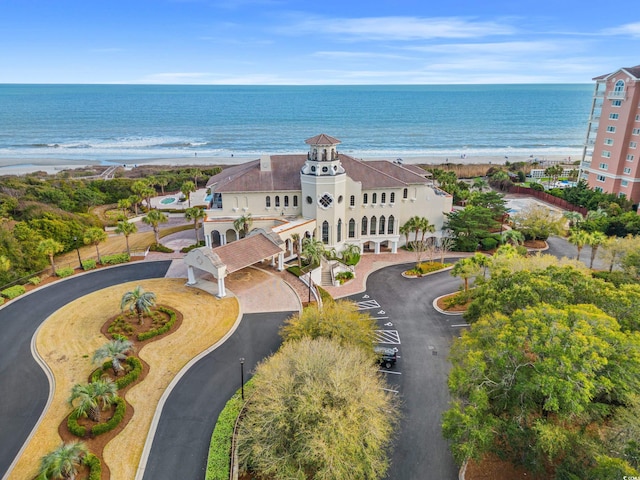 aerial view of waterfront with a beach