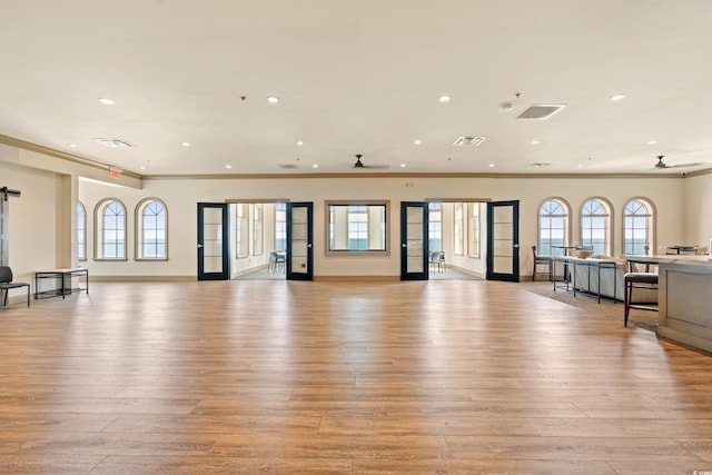 community lobby featuring crown molding and recessed lighting