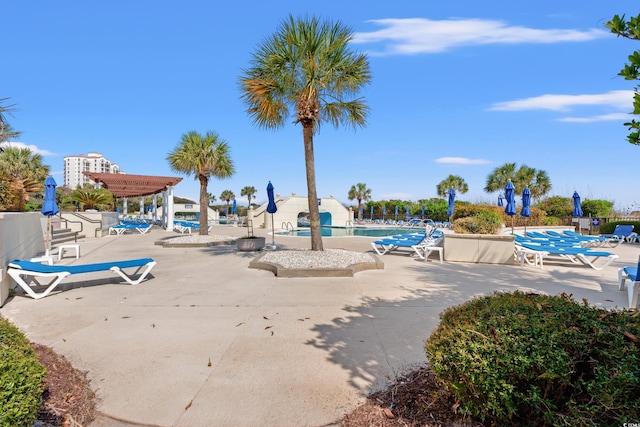 community pool featuring a patio