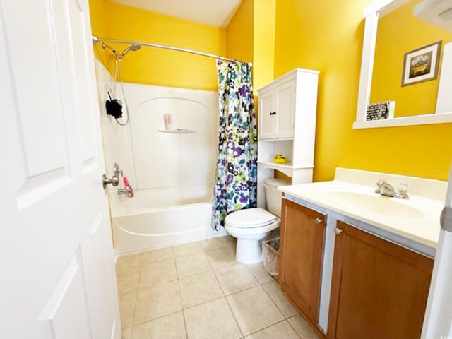 full bathroom with toilet, tile patterned floors, shower / tub combo, and vanity