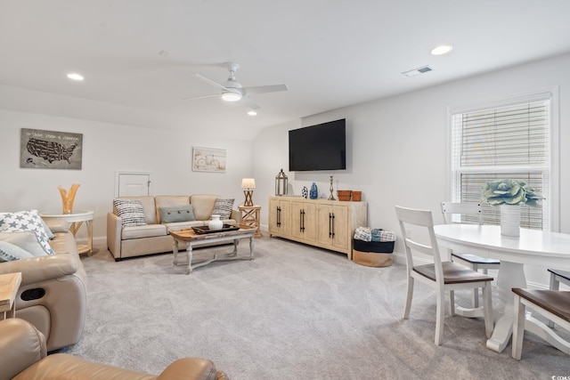 living room with recessed lighting, ceiling fan, light colored carpet, and visible vents
