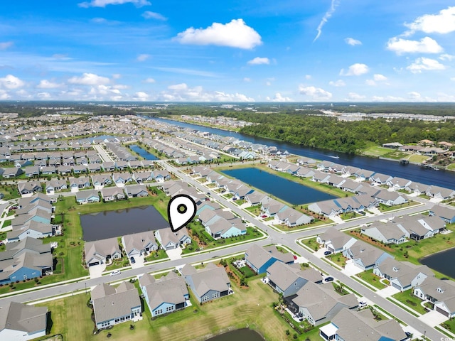 aerial view featuring a water view and a residential view