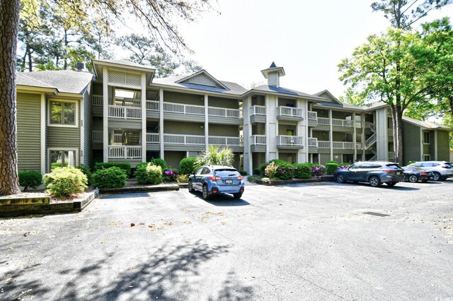 1401 Lighthouse Dr Unit 4226, North Myrtle Beach, SC 29582 - view of property featuring uncovered parking
