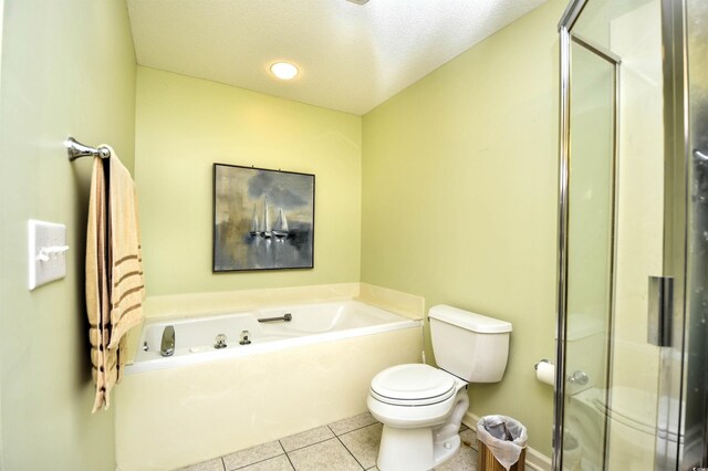 1401 Lighthouse Dr Unit 4226, North Myrtle Beach, SC 29582 - bathroom featuring toilet, a shower stall, tile patterned flooring, and a garden tub