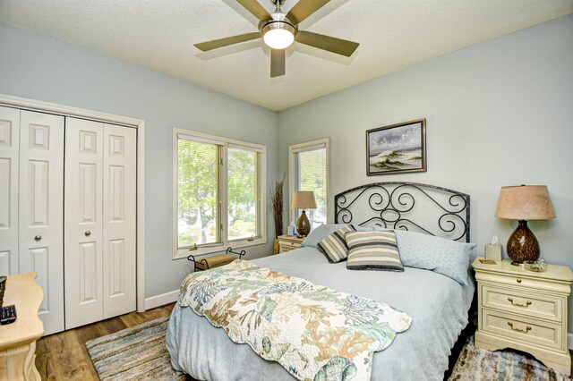 1401 Lighthouse Dr Unit 4226, North Myrtle Beach, SC 29582 - bedroom featuring a closet, a ceiling fan, baseboards, and wood finished floors