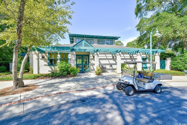 1401 Lighthouse Dr Unit 4226, North Myrtle Beach, SC 29582 - view of front of property with stucco siding and french doors
