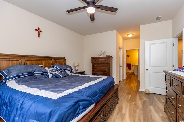 40 Parkside Dr, Pawleys Island, SC 29585 - bedroom featuring light wood-style floors, ceiling fan, and baseboards