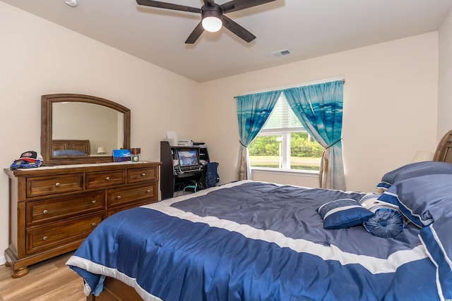 40 Parkside Dr, Pawleys Island, SC 29585 - bedroom featuring light wood finished floors and ceiling fan
