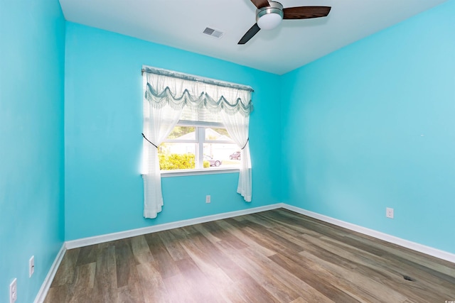 40 Parkside Dr, Pawleys Island, SC 29585 - unfurnished room with ceiling fan, wood finished floors, and baseboards
