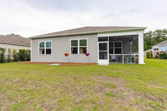 40 Parkside Dr, Pawleys Island, SC 29585 - rear view of property with a sunroom