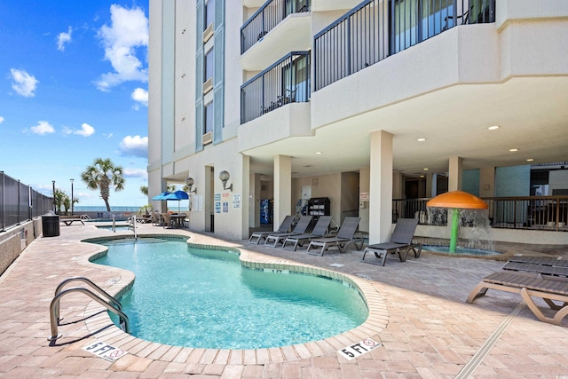 pool featuring a patio