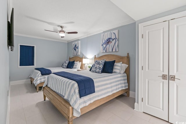 bedroom featuring crown molding, baseboards, and ceiling fan