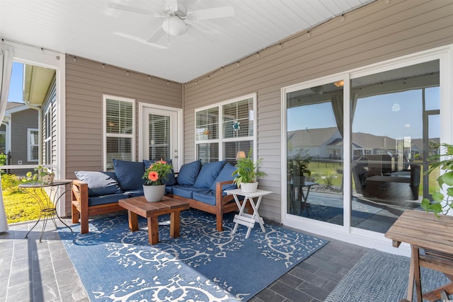 sunroom / solarium with an outdoor hangout area and ceiling fan