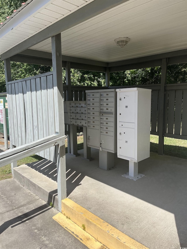 view of home's community featuring mail area