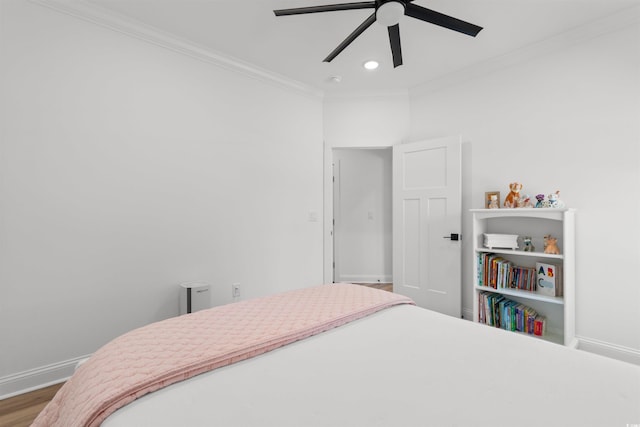 bedroom featuring crown molding, recessed lighting, baseboards, a ceiling fan, and wood finished floors