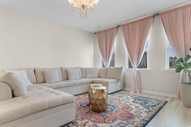 315 Cattle Drive Cir, Myrtle Beach, SC 29588 - living area with a chandelier, light wood finished floors, and baseboards