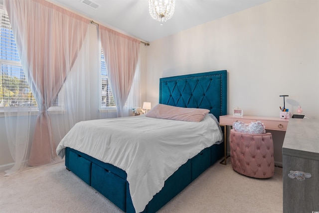 315 Cattle Drive Cir, Myrtle Beach, SC 29588 - carpeted bedroom with a chandelier