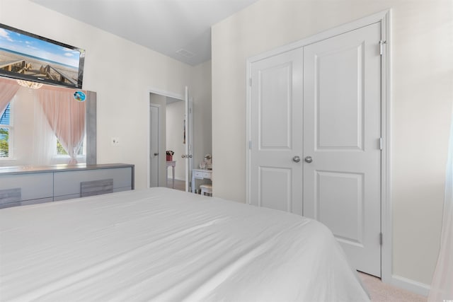 315 Cattle Drive Cir, Myrtle Beach, SC 29588 - bedroom with a closet, baseboards, and carpet floors