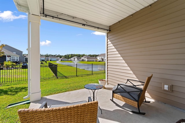 315 Cattle Drive Cir, Myrtle Beach, SC 29588 - view of patio / terrace featuring a residential view and a water view