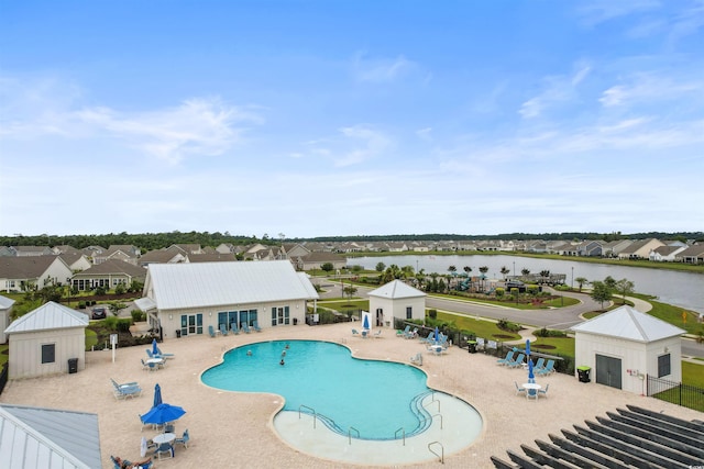 315 Cattle Drive Cir, Myrtle Beach, SC 29588 - community pool featuring a patio, a residential view, fence, and a water view