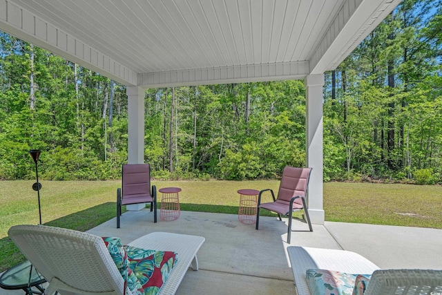 847 Flowering Branch Ave, Little River, SC 29566 - view of patio with a wooded view