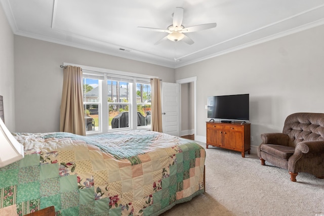 bedroom featuring ceiling fan, light colored carpet, baseboards, visible vents, and ornamental molding