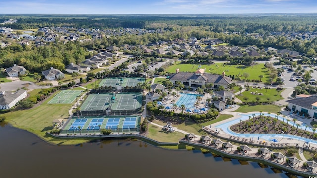 birds eye view of property featuring a water view and a residential view
