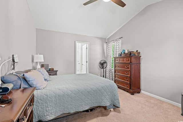 bedroom with lofted ceiling, carpet floors, baseboards, and a ceiling fan
