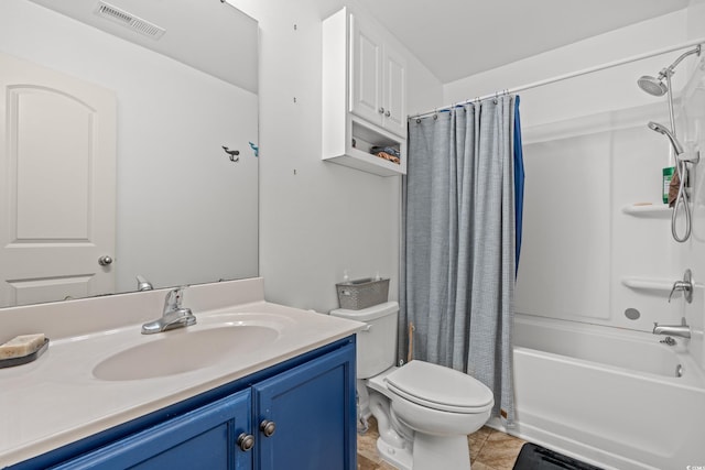 full bath featuring toilet, vanity, shower / tub combo, and tile patterned flooring