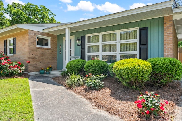 558 Juniper Dr -, Unit Myrtle Beach, SC 29577 - property entrance featuring a porch and brick siding