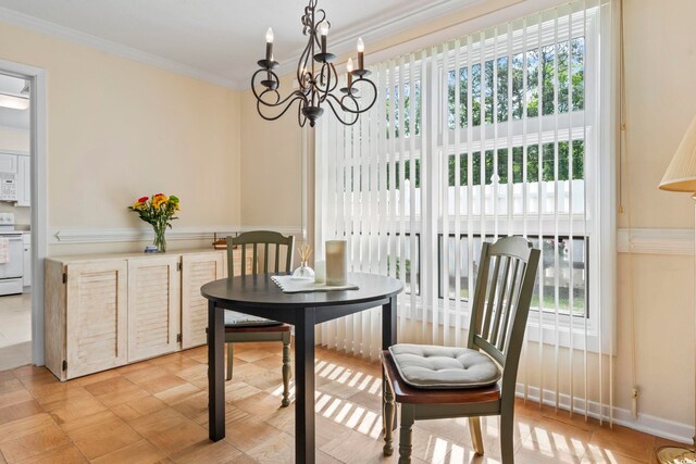 558 Juniper Dr -, Unit Myrtle Beach, SC 29577 - dining space with ornamental molding, a notable chandelier, and plenty of natural light