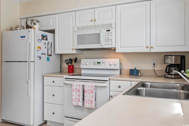 558 Juniper Dr -, Unit Myrtle Beach, SC 29577 - kitchen with white cabinetry, white appliances, and light countertops