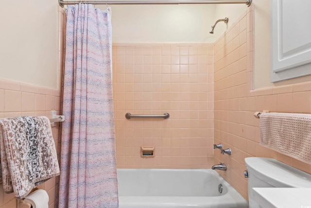 558 Juniper Dr -, Unit Myrtle Beach, SC 29577 - bathroom with toilet, wainscoting, tile walls, and shower / bathtub combination with curtain