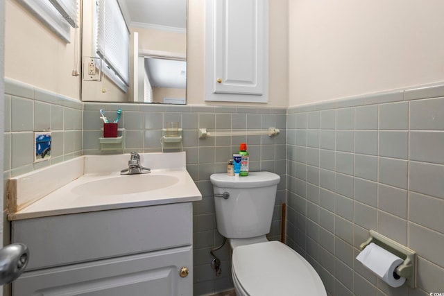 558 Juniper Dr -, Unit Myrtle Beach, SC 29577 - bathroom featuring toilet, tile walls, wainscoting, vanity, and ornamental molding