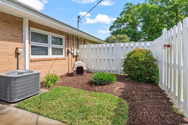 558 Juniper Dr -, Unit Myrtle Beach, SC 29577 - view of yard featuring central air condition unit and fence