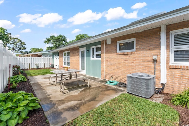 558 Juniper Dr -, Unit Myrtle Beach, SC 29577 - view of patio / terrace with outdoor dining area, central AC unit, and fence