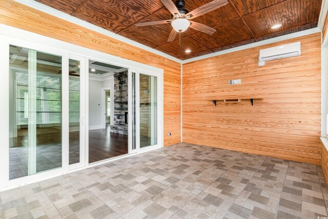 1400 James Island Ave, North Myrtle Beach, SC 29582 - unfurnished sunroom featuring a wall unit AC