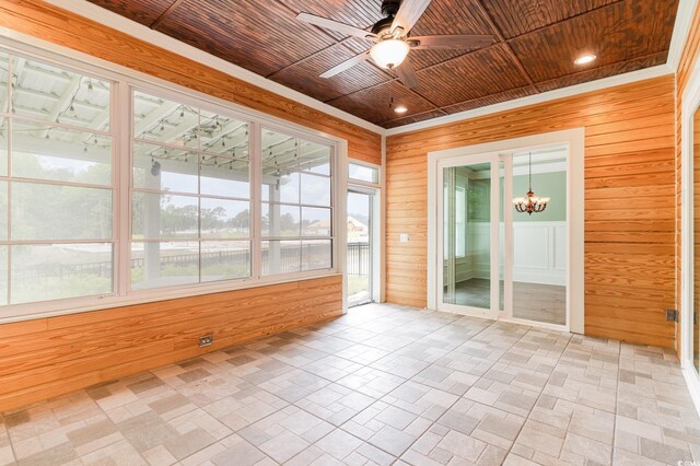 1400 James Island Ave, North Myrtle Beach, SC 29582 - unfurnished sunroom with ceiling fan, healthy amount of natural light, and a chandelier