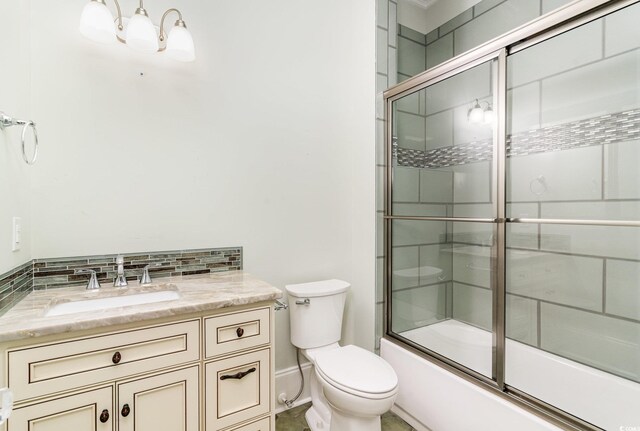 1400 James Island Ave, North Myrtle Beach, SC 29582 - bathroom with toilet, combined bath / shower with glass door, and vanity