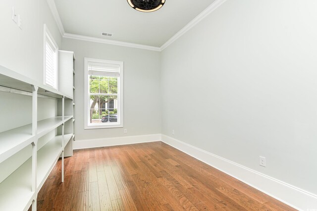 1400 James Island Ave, North Myrtle Beach, SC 29582 - unfurnished room with hardwood / wood-style floors, crown molding, and baseboards