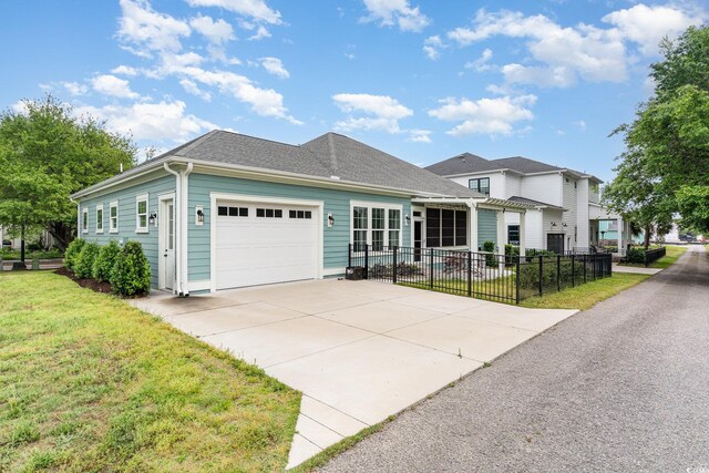 1400 James Island Ave, North Myrtle Beach, SC 29582 - view of front facade with a garage and driveway