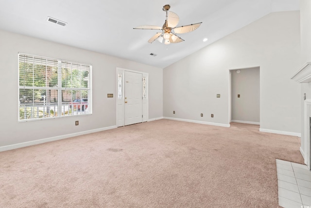68 Voyagers Dr, Pawleys Island, SC 29585 - entrance foyer featuring light colored carpet, a ceiling fan, baseboards, and high vaulted ceiling