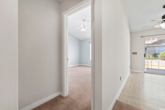 68 Voyagers Dr, Pawleys Island, SC 29585 - hallway with baseboards, carpet flooring, and lofted ceiling