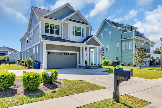 260 Palmetto Harbour Dr, North Myrtle Beach, SC 29582 - craftsman house with board and batten siding, a standing seam roof, metal roof, a garage, and concrete driveway