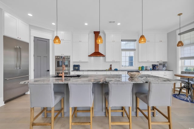 260 Palmetto Harbour Dr, North Myrtle Beach, SC 29582 - kitchen featuring white cabinets, backsplash, stainless steel built in refrigerator, and a kitchen breakfast bar