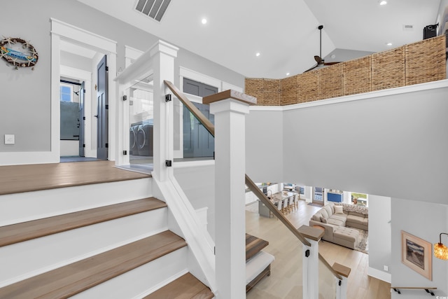 260 Palmetto Harbour Dr, North Myrtle Beach, SC 29582 - stairs with high vaulted ceiling, recessed lighting, wood finished floors, and visible vents