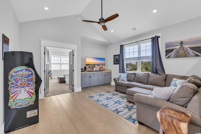 260 Palmetto Harbour Dr, North Myrtle Beach, SC 29582 - living room featuring high vaulted ceiling, a ceiling fan, light wood-style flooring, and a wealth of natural light