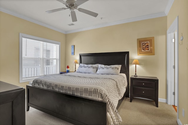 bedroom featuring ceiling fan, carpet, baseboards, visible vents, and ornamental molding