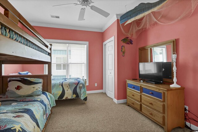 156 Via Old Sound Blvd Unit C, Ocean Isle Beach, NC 28469 - bedroom featuring ceiling fan, visible vents, baseboards, ornamental molding, and light carpet
